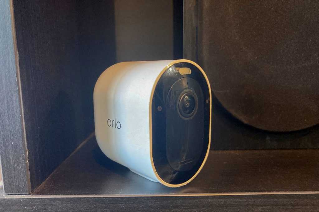 Arlo Pro 5S 2K security camera on a bookshelf