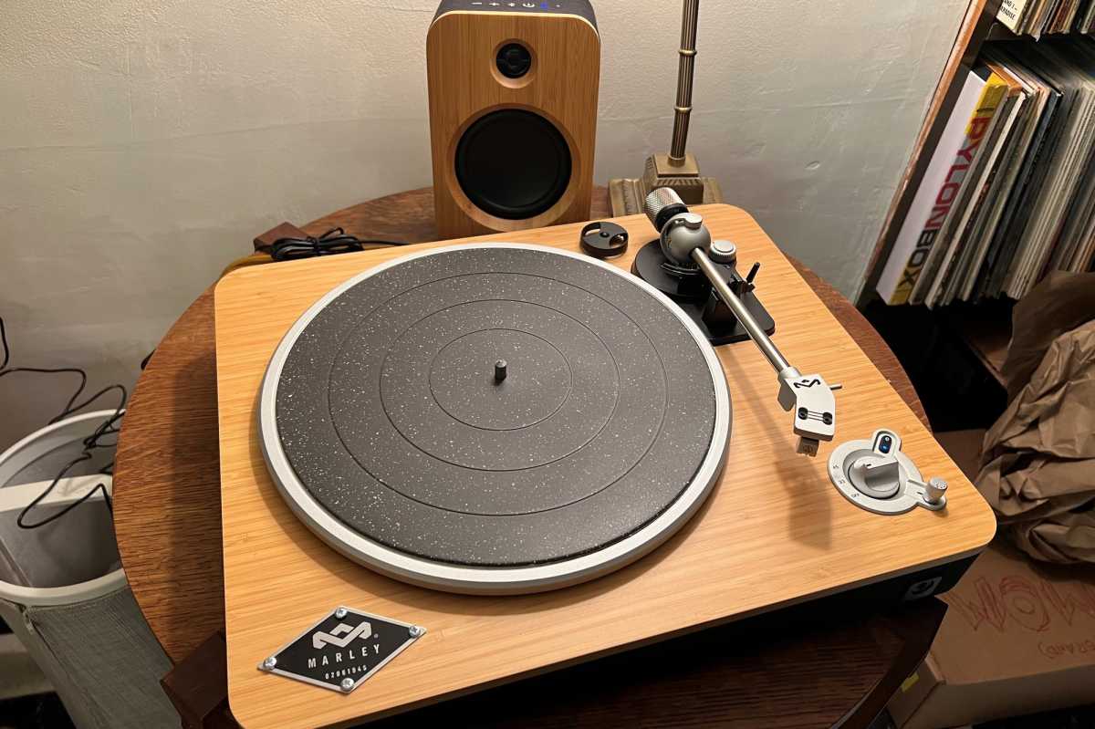 House of Marley Stir It Up turntable with wireless speaker in background